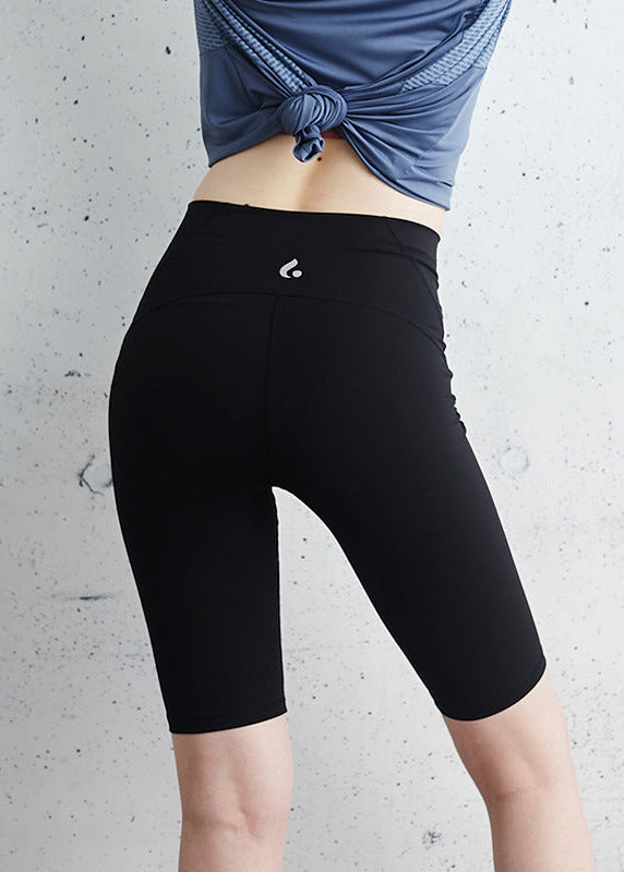 Short de sport moulant taille haute pour femme